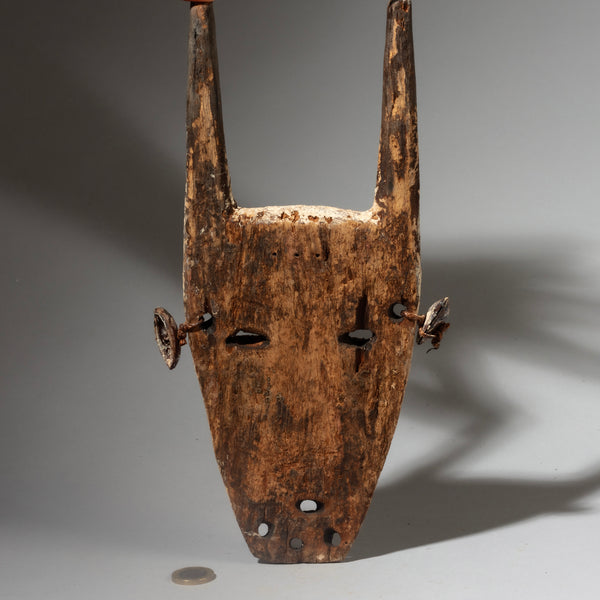 A STRIKING  “IDIMU” KAOLIN ENCRUSTED LEGA TRIBE MASK ( No 4244 )