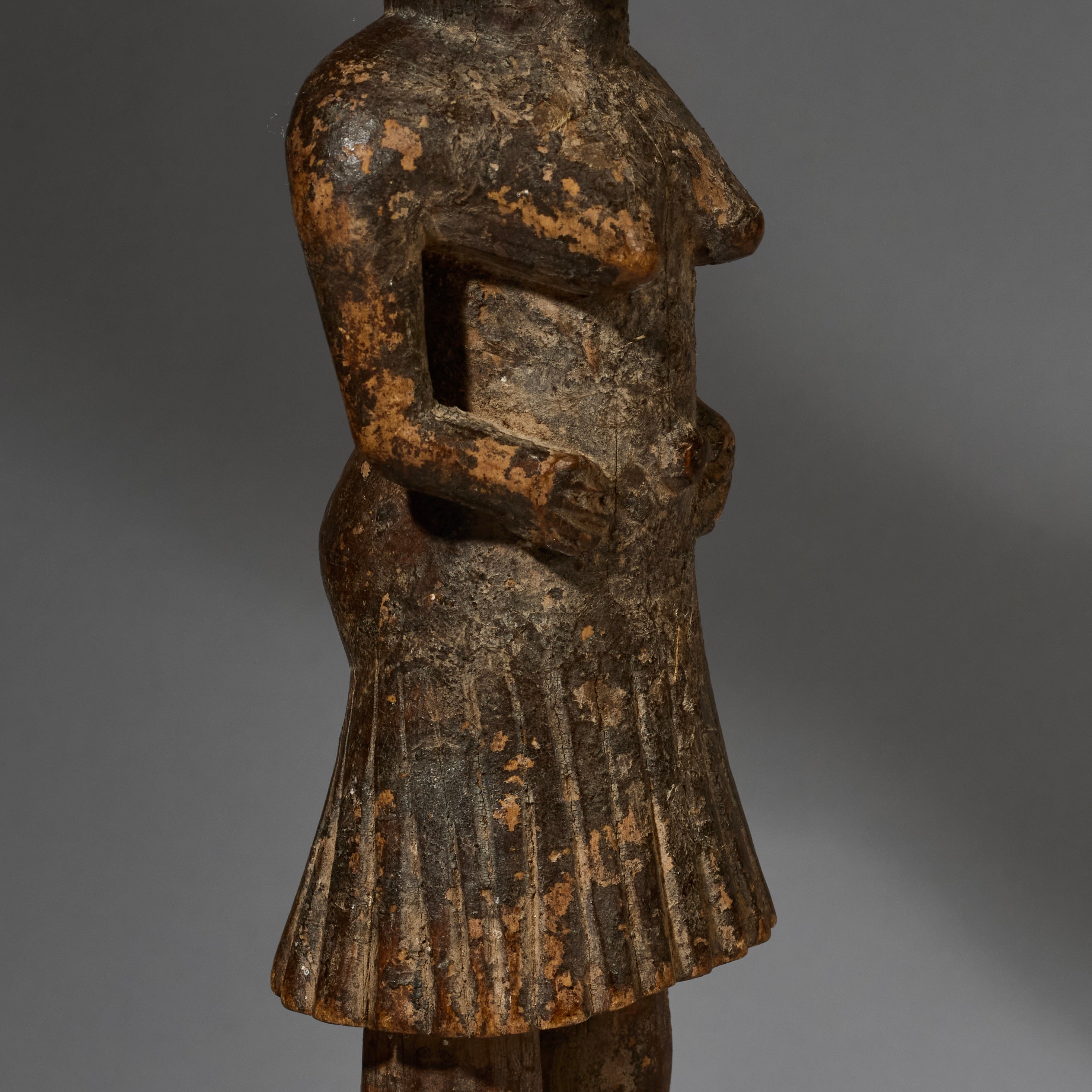 AN ENCRUSTED LOBI THIL STATUE WITH UNUSUAL FEATURES ( No 2777 )