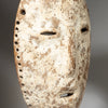 A PRETTY IDIMU” KAOLIN ENCRUSTED LEGA TRIBE MASK ( No 4243 )
