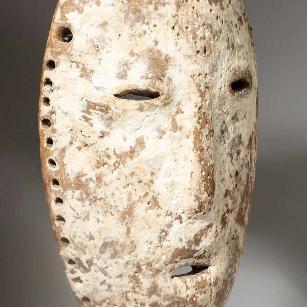 A PRETTY IDIMU” KAOLIN ENCRUSTED LEGA TRIBE MASK ( No 4243 )