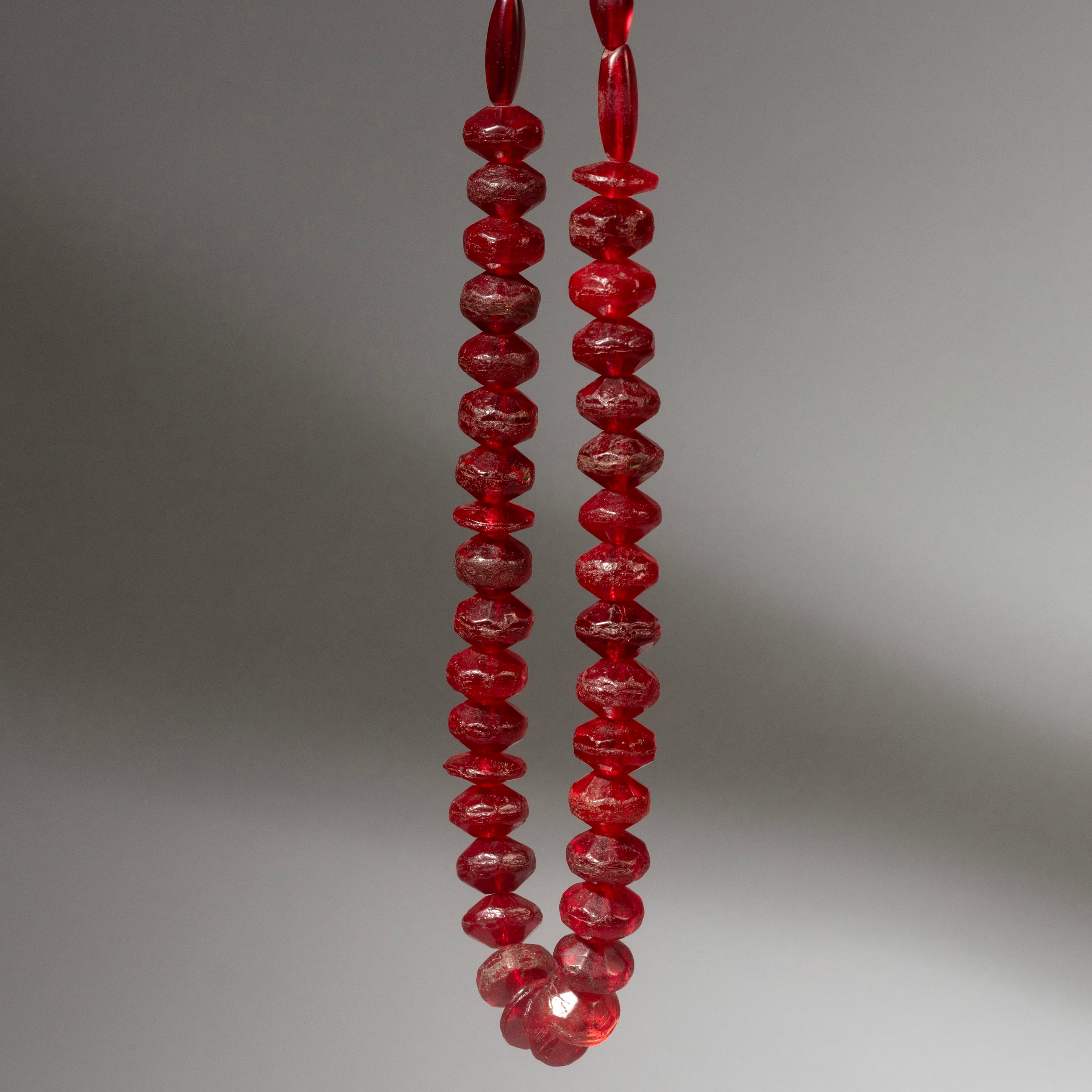 A VIBRANT STRING OF RED 1920s BOHEMIAN GLASS TRADE BEADS ( No 4288 )