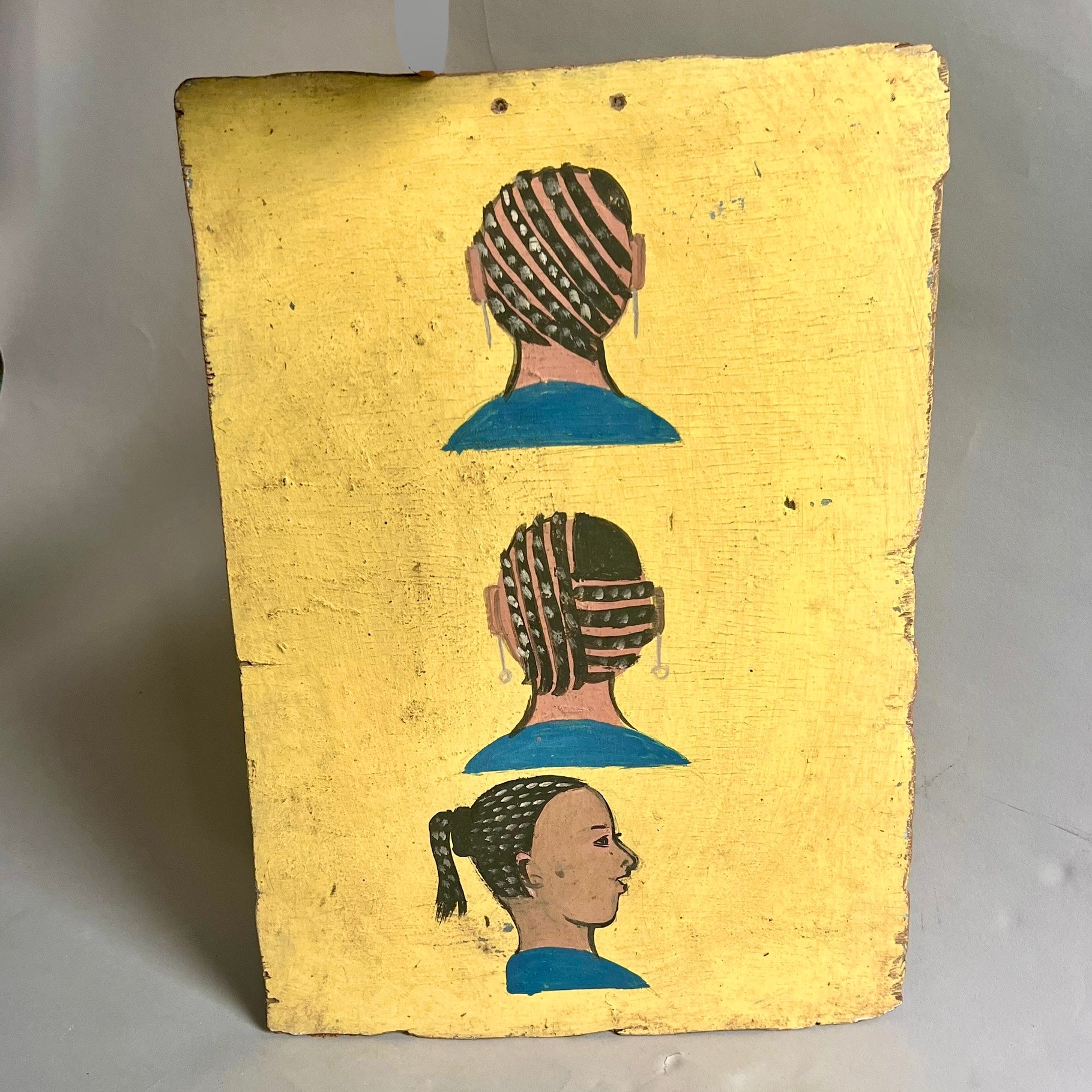 A BRIGHT YELLOW HAIRDRESSERS BOARD, WEST AFRICA ( No 2686)