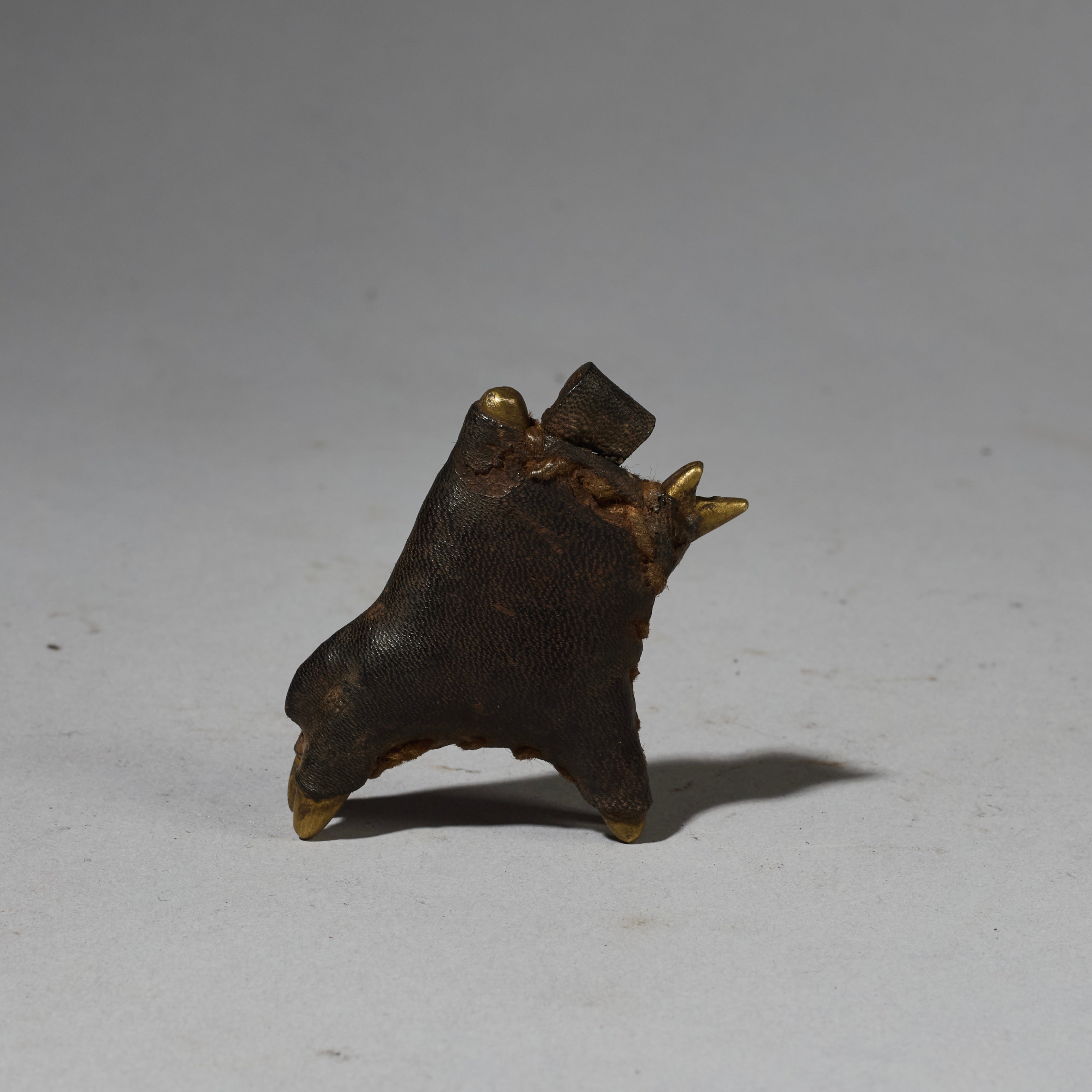 A LEATHER COVERED KOTOKO HORSE + RIDER PENDANT, CAMEROON ( No 2752 )