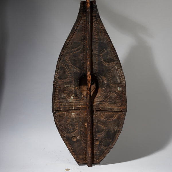 Sold AN EMBOSSED METAL SHIELD, DINKA TRIBE  E.AFRICA WITH GOOD AGE AND PATINA  ( No 4283 )