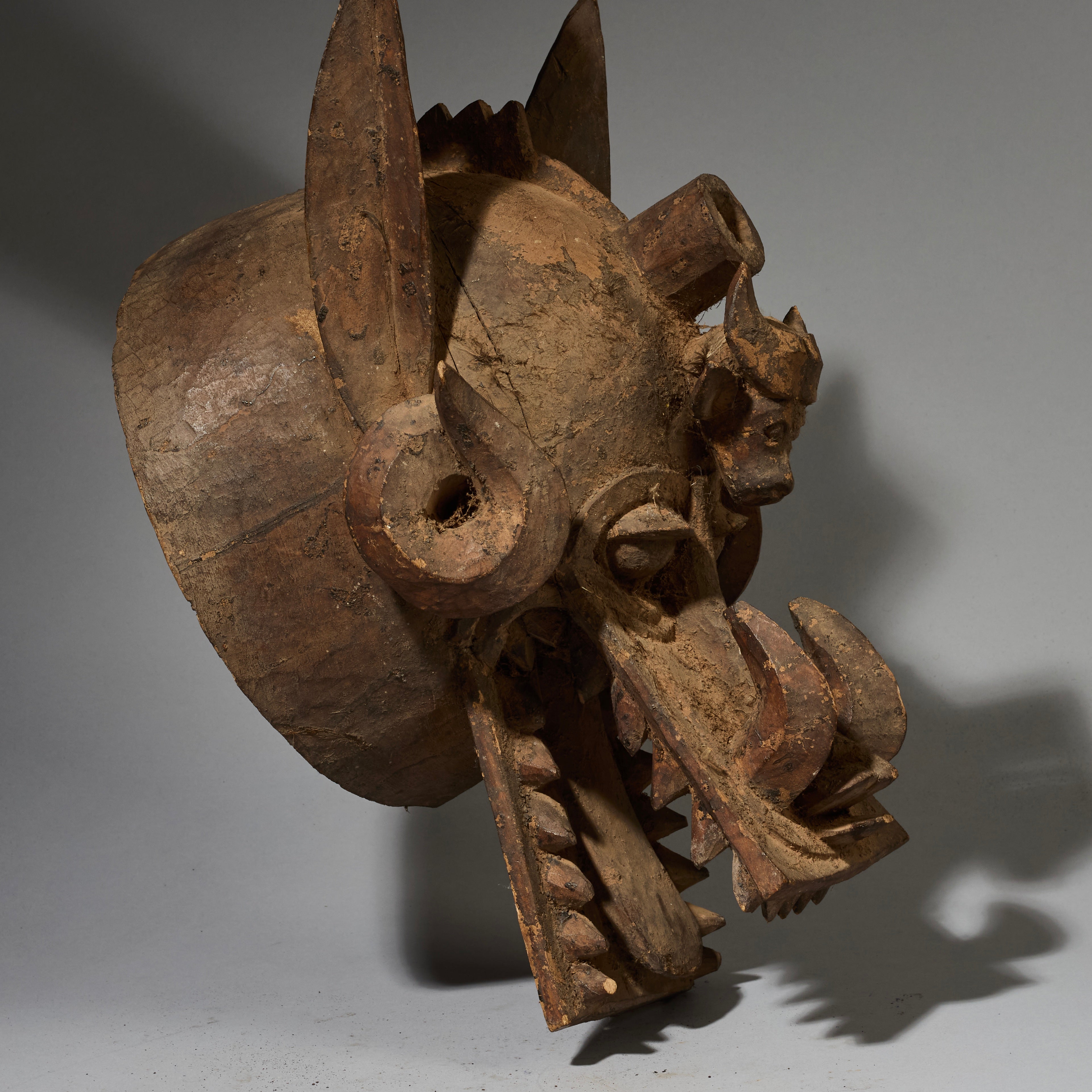 A DETAILED COMPACT FIRESPITTER MASK, SENOUFO TRIBE BURKINA FASO  ( No 2821 )