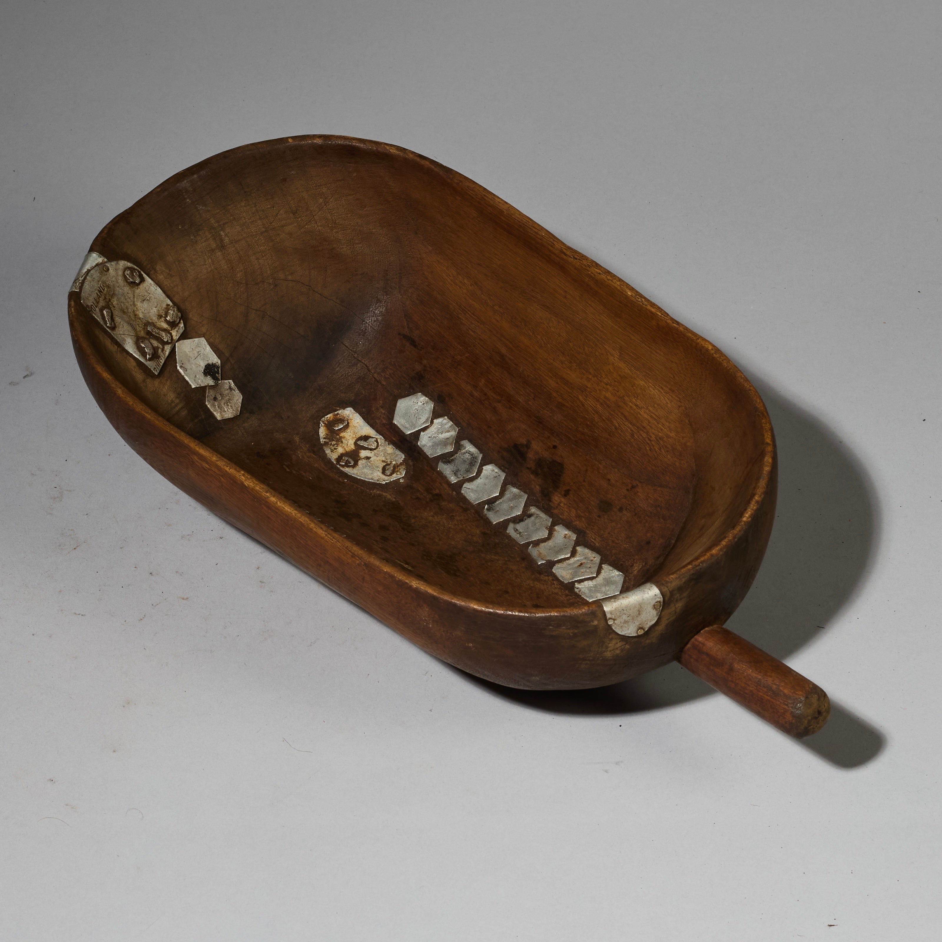 A GENEROUS WOODEN BOWL WITH ARTFUL METAL INDIGENOUS REPAIRS FROM THE TUTSI TRIBE OF RWANDA ( No 2743 )