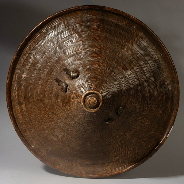 A WONDERFULLY DETAILED, 19THC EMBOSSED LEATHER SHIELD, FROM ETHIOPIA EAST AFRICA EX UK COLL. ( No 4374 )