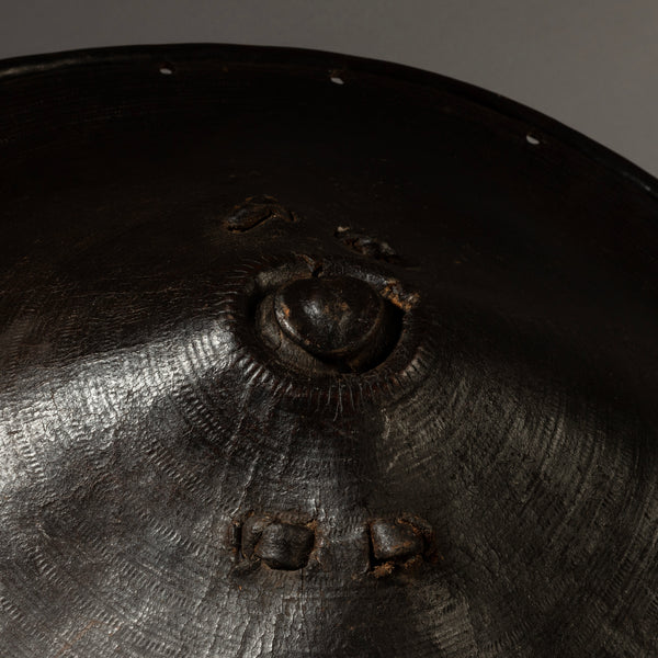 A SCULPTURAL LEATHER SHIELD, FROM ETHIOPIA EAST AFRICA EX UK COLL. ( No 4372 )