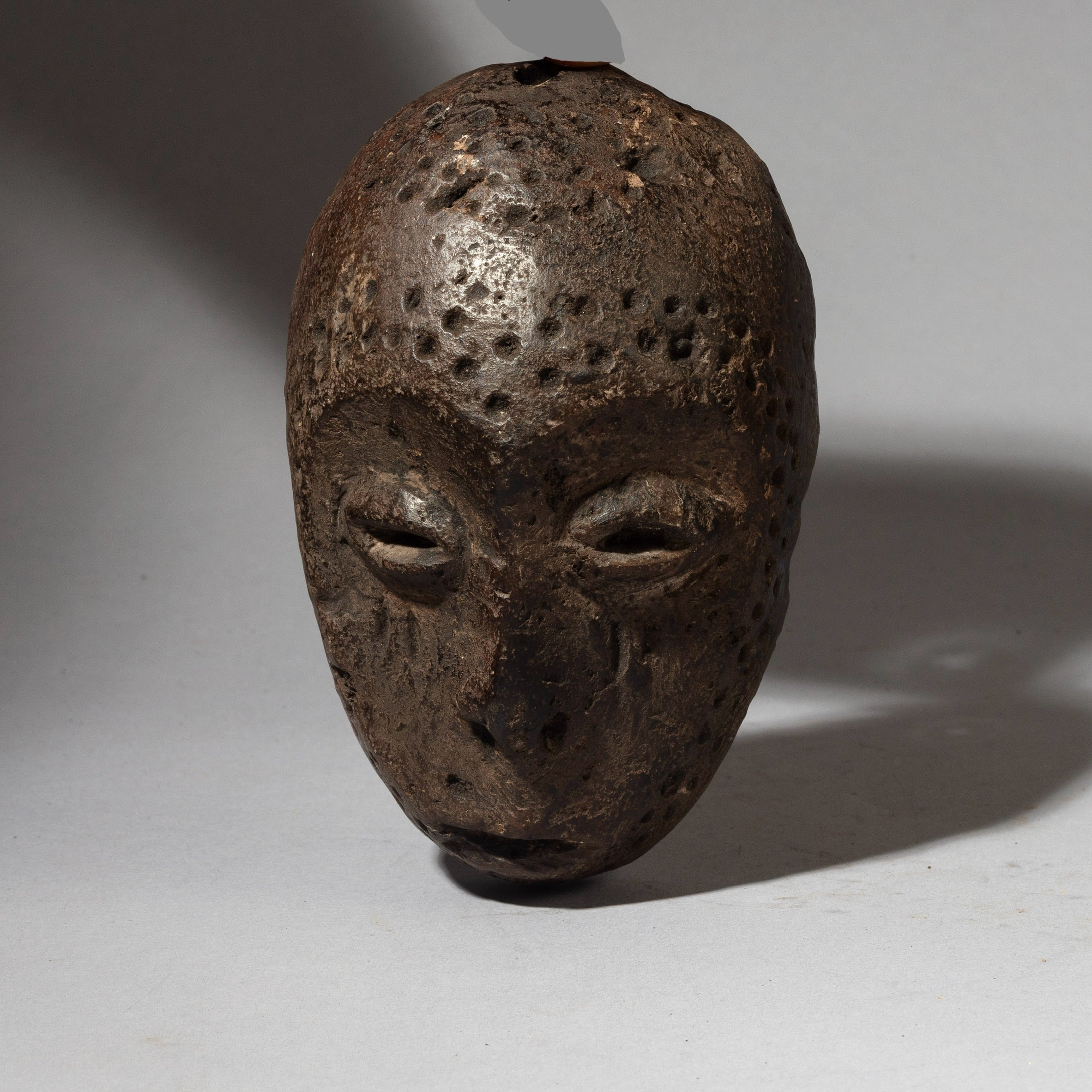 A RARE STONE MINIATURE MASK, LEGA TRIBE MASK OF THE CONGO ( No 4353 )
