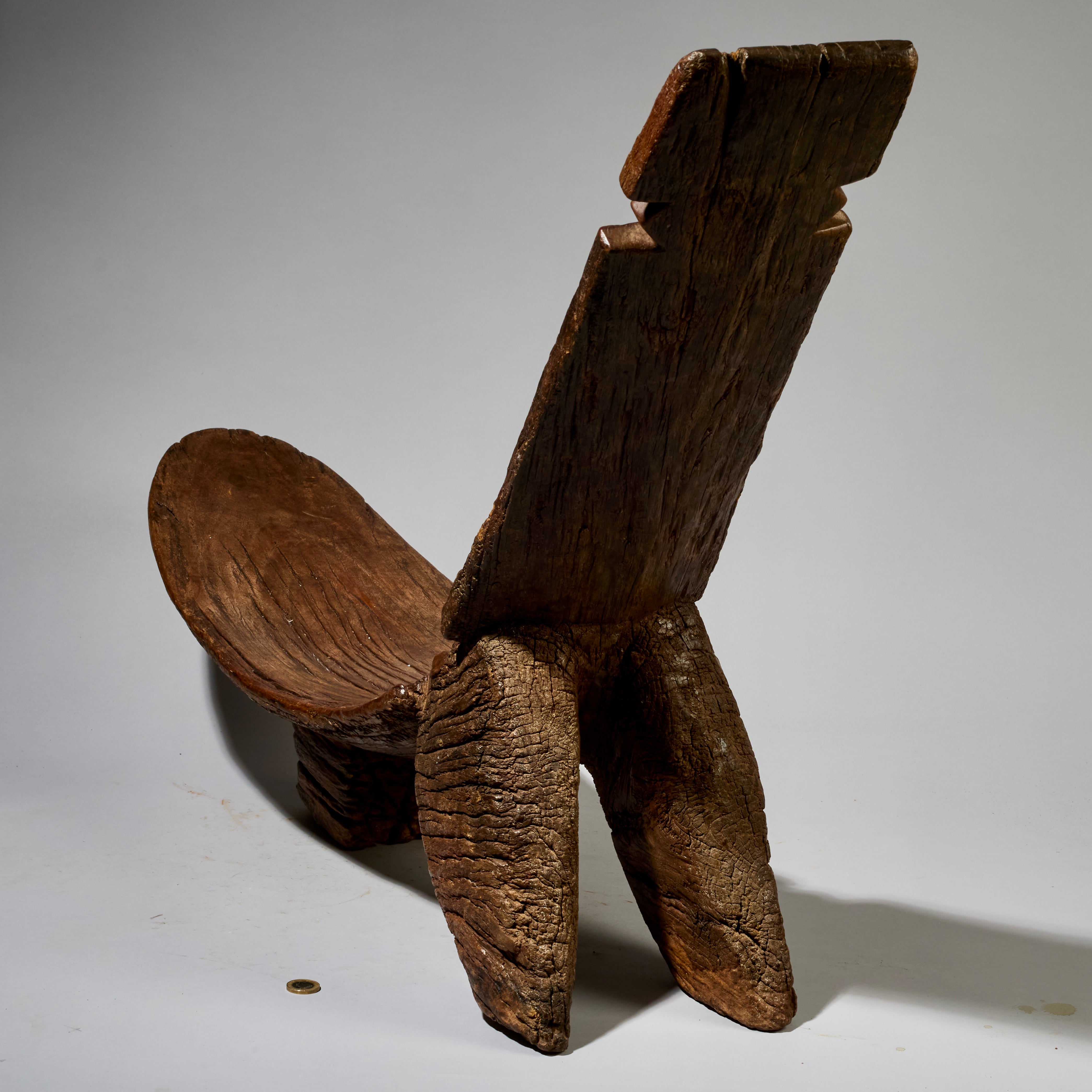 AN OLD, WELL PATINATED SLING BACK BENCH, LOBI TRIBE OF BURKINA FASO W.AFRICA ( No 2827 )