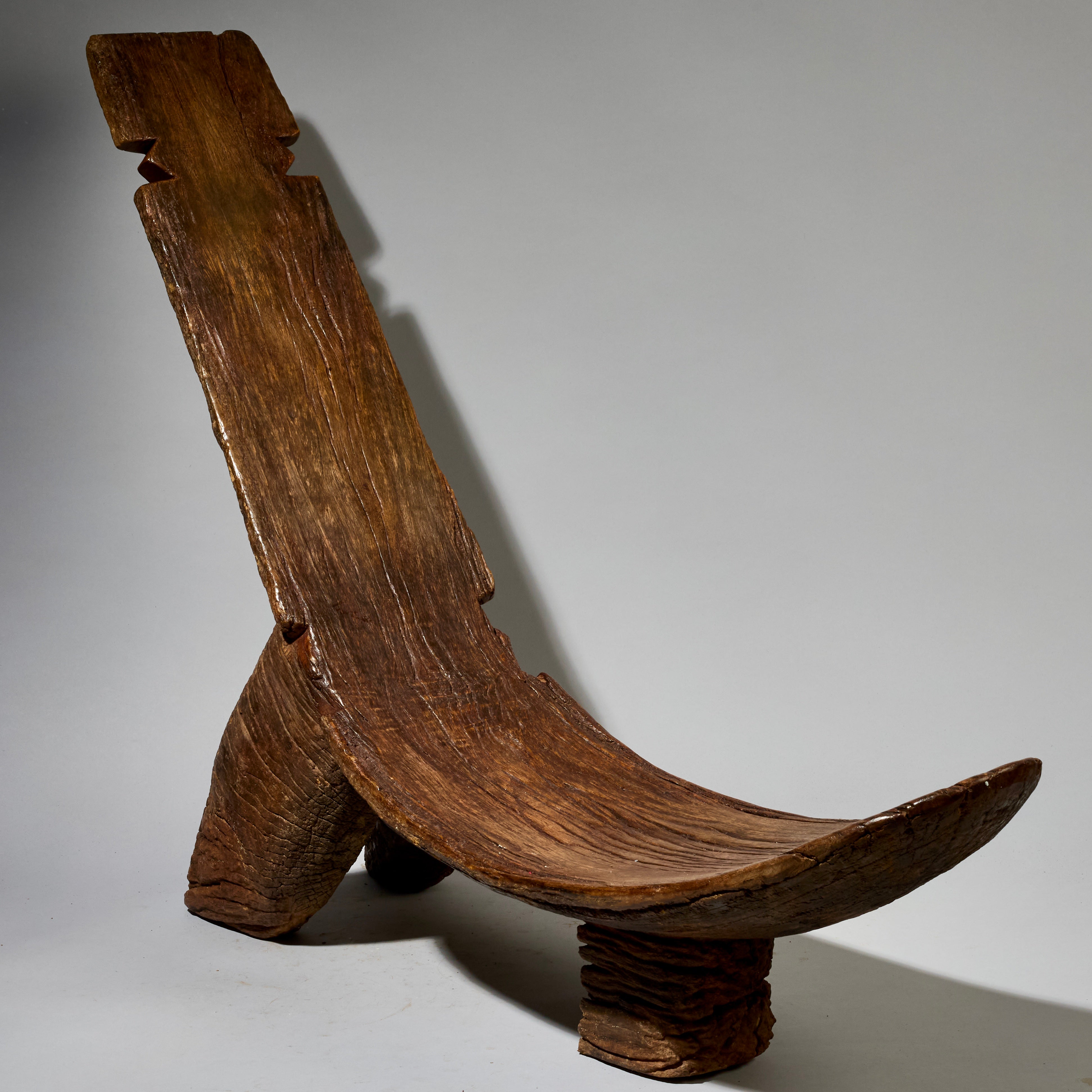 AN OLD, WELL PATINATED SLING BACK BENCH, LOBI TRIBE OF BURKINA FASO W.AFRICA ( No 2827 )