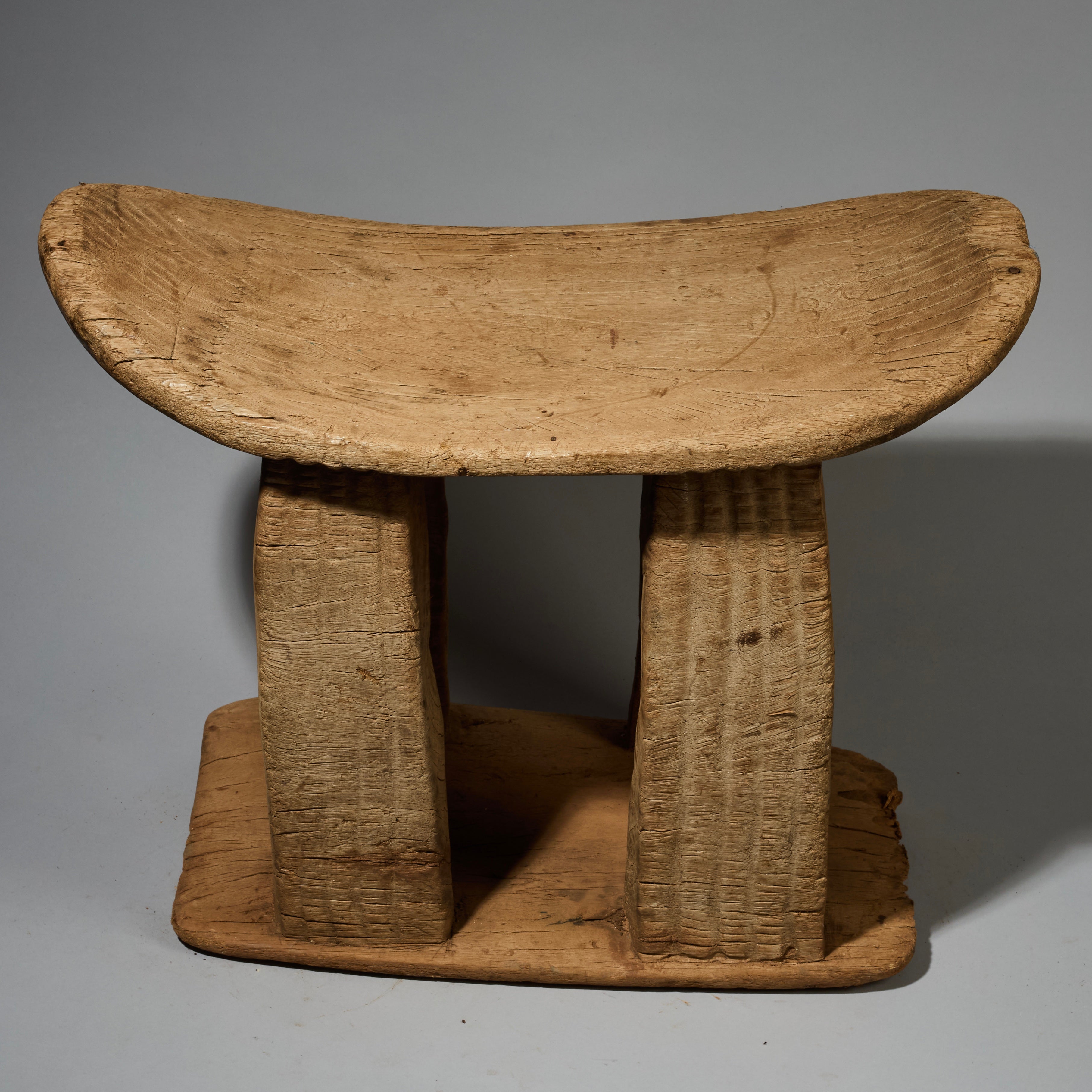 AN OLD, WELL PATINATED TALL STOOL, GURUNSI TRIBE OF BURKINA FASO W.AFRICA ( No 2828 )