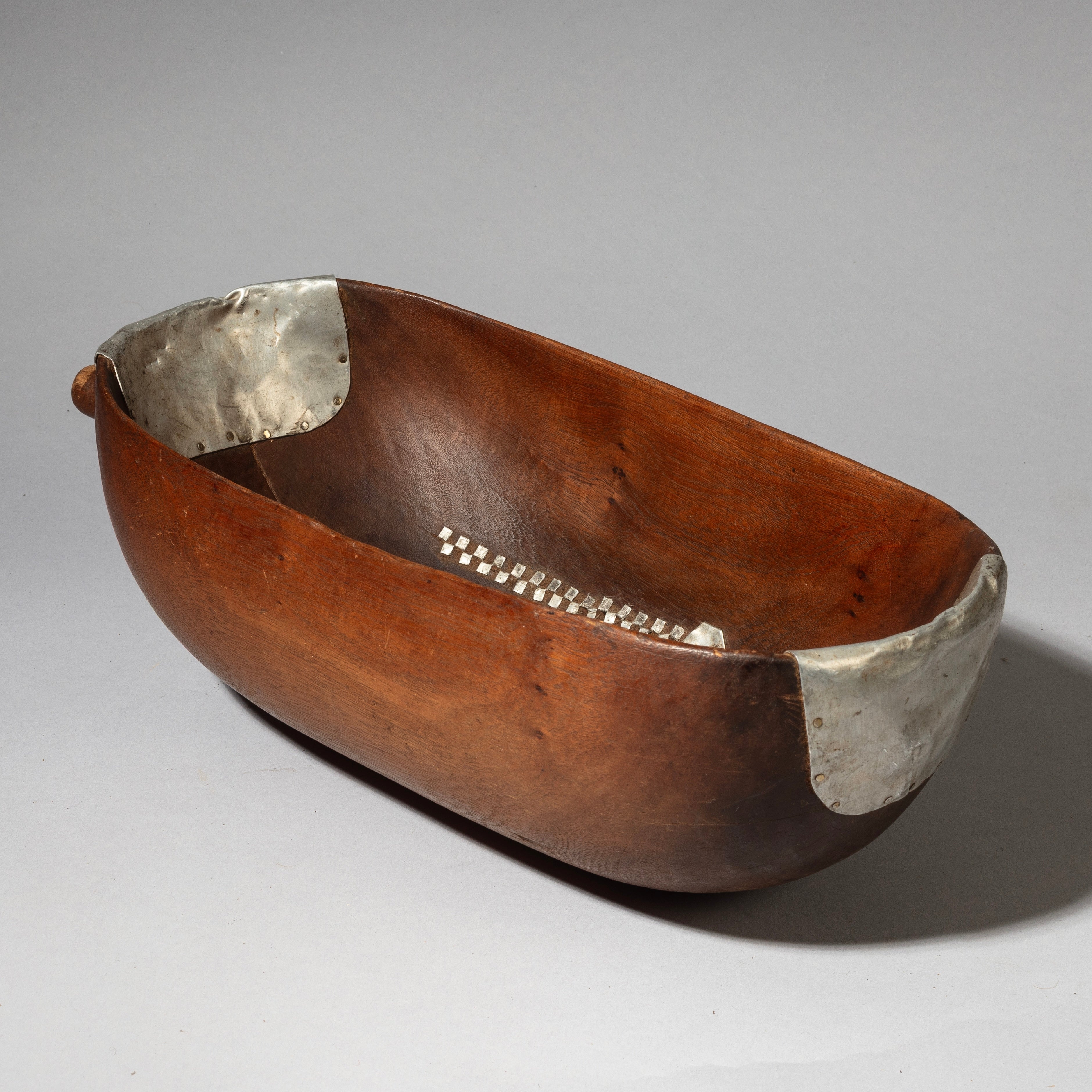 A CURVY  WOODEN MEDIUMBOWL WITH METAL INDIGENOUS REPAIRS FROM THE TUTSI TRIBE OF RWANDA ( No 4320 )