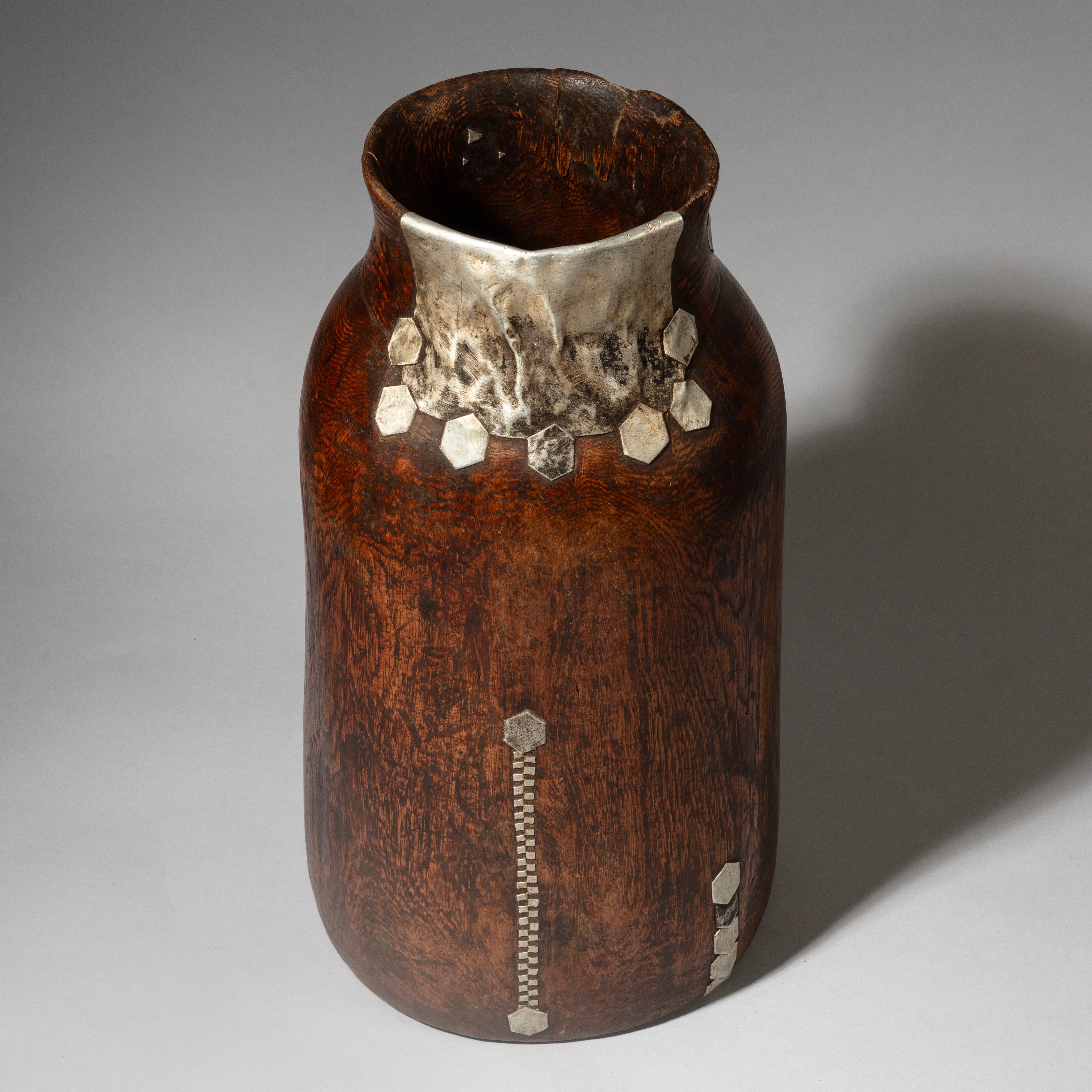 A XLARGE HONEY POT WITH METAL INDIGENOUS REPAIRS FROM THE TUTSI TRIBE OF RWANDA ( No 4358 )