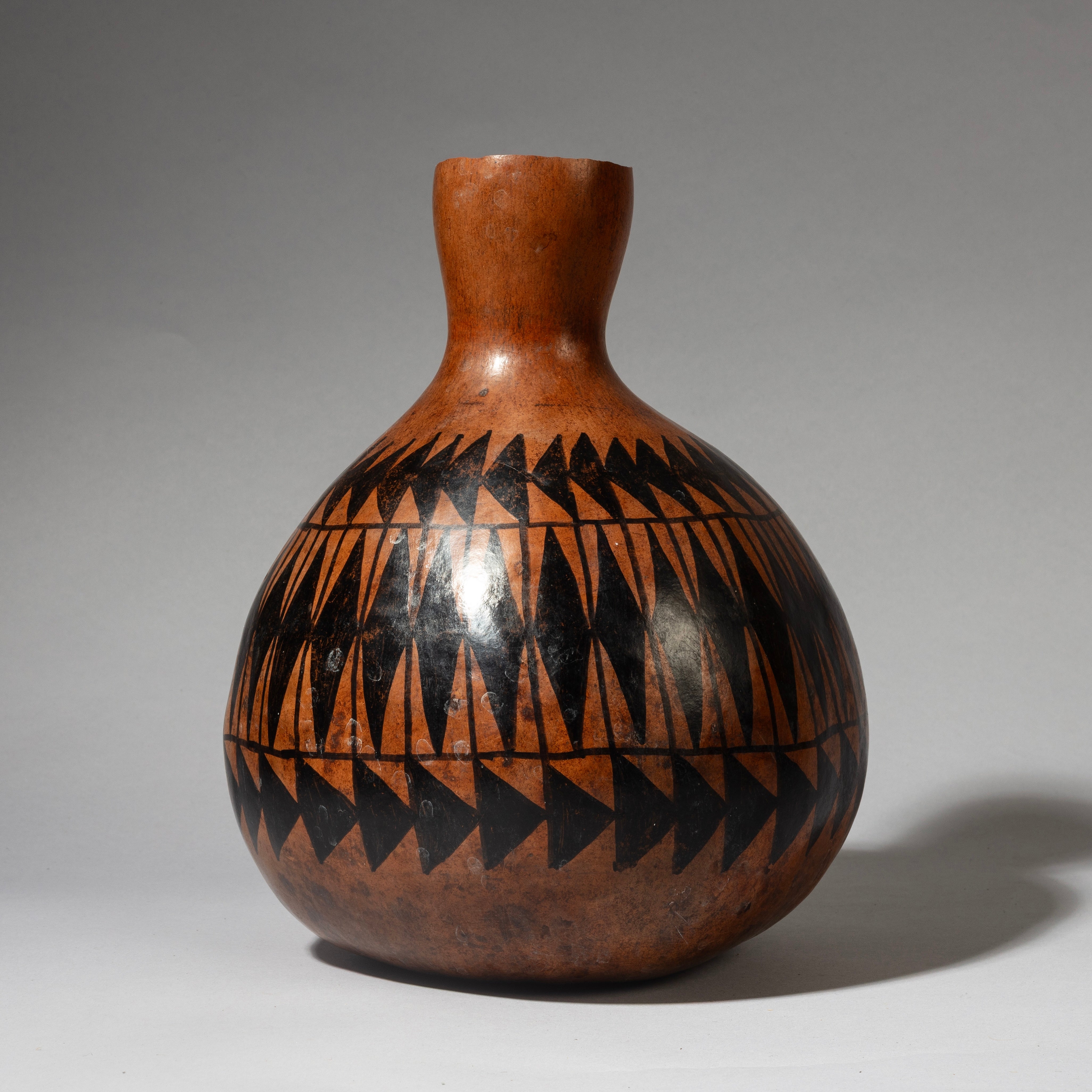 A SHAPELY, SMALL WELL DECORATED GOURD VESSEL FROM TUTSI TRIBE OF RWANDA E. AFRICA ( No 4342 )