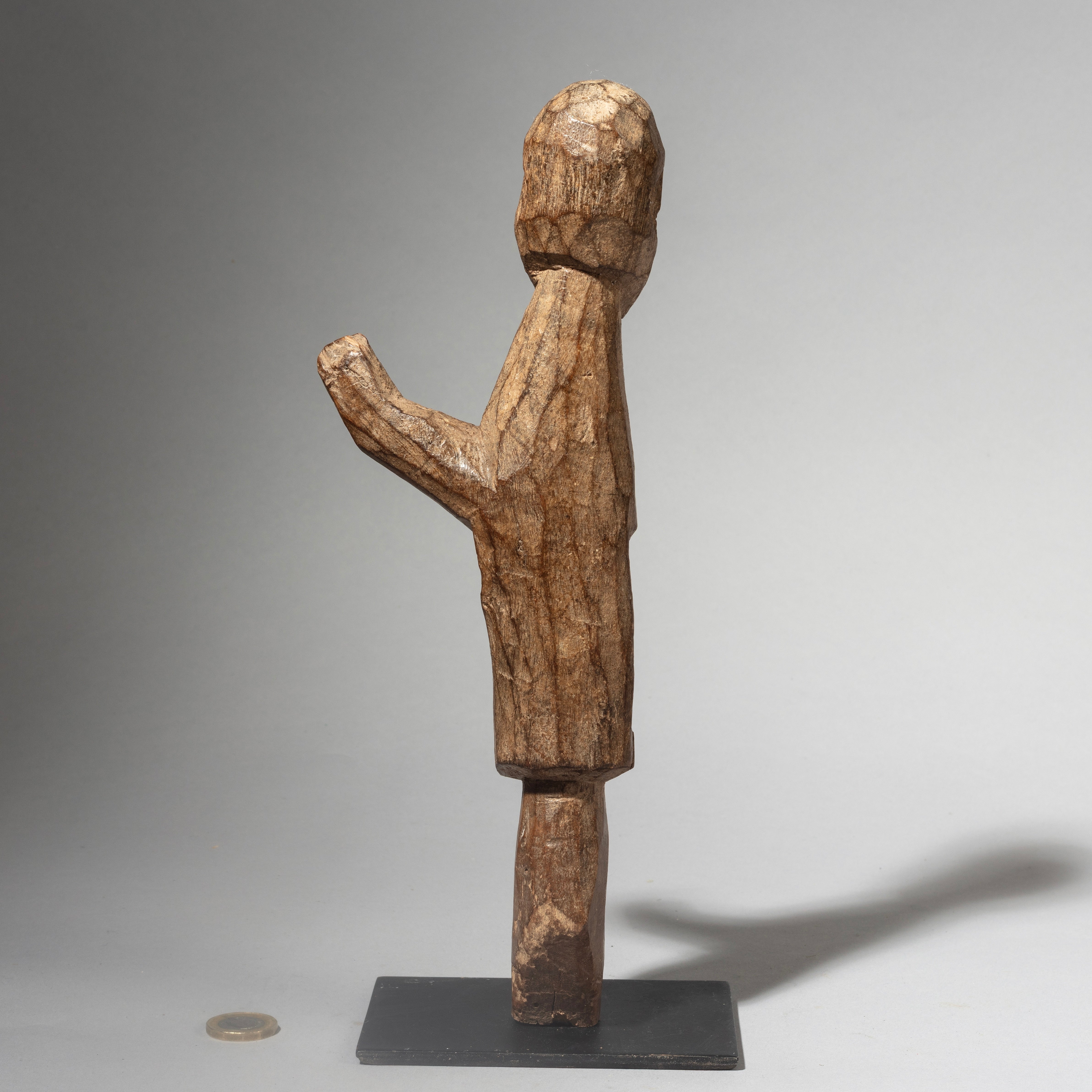 A ONE ARM RASIED LOBI THIL FIGURE FROM BURKINA FASO ( No 4399 )