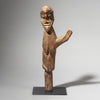 A ONE ARM RASIED LOBI THIL FIGURE FROM BURKINA FASO ( No 4399 )