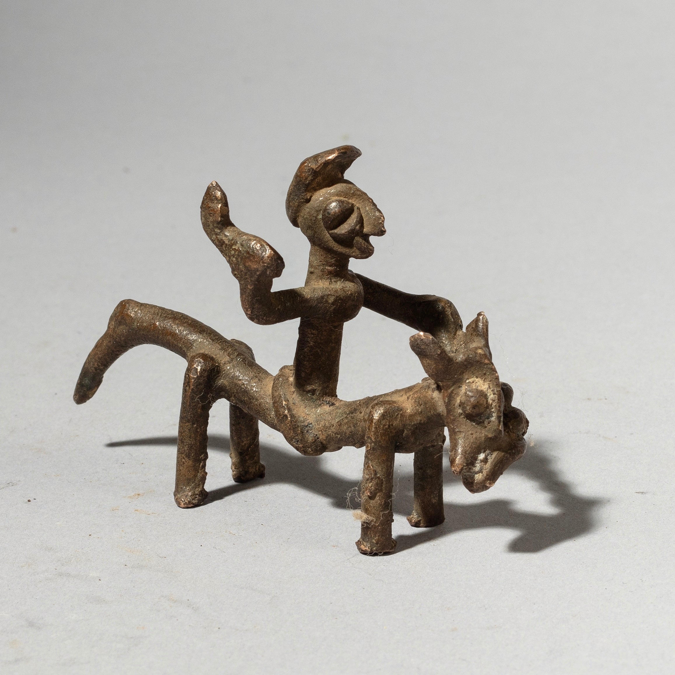A SERPENTINE HORSE + RIDER BRONZE CHARM, SENOUFO TRIBE BURKINA FASO ( No 4381)