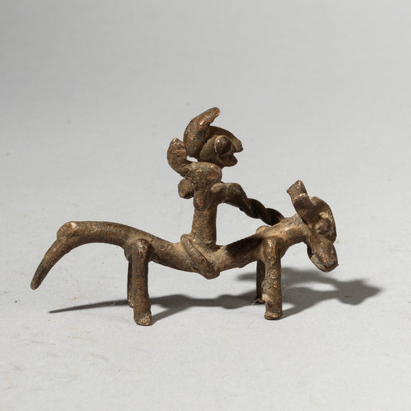 A SERPENTINE HORSE + RIDER BRONZE CHARM, SENOUFO TRIBE BURKINA FASO ( No 4381)