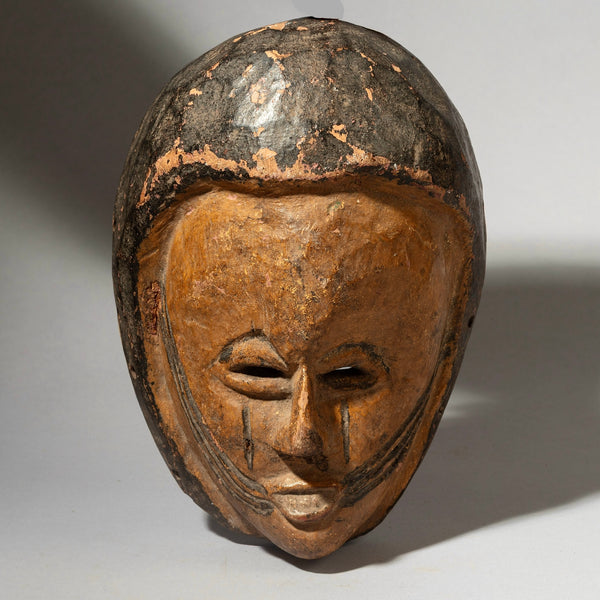 A RESONANT CEREMONIAL MASK FROM THE IGBO TRIBE OF NIGERIA  (No 4443 )