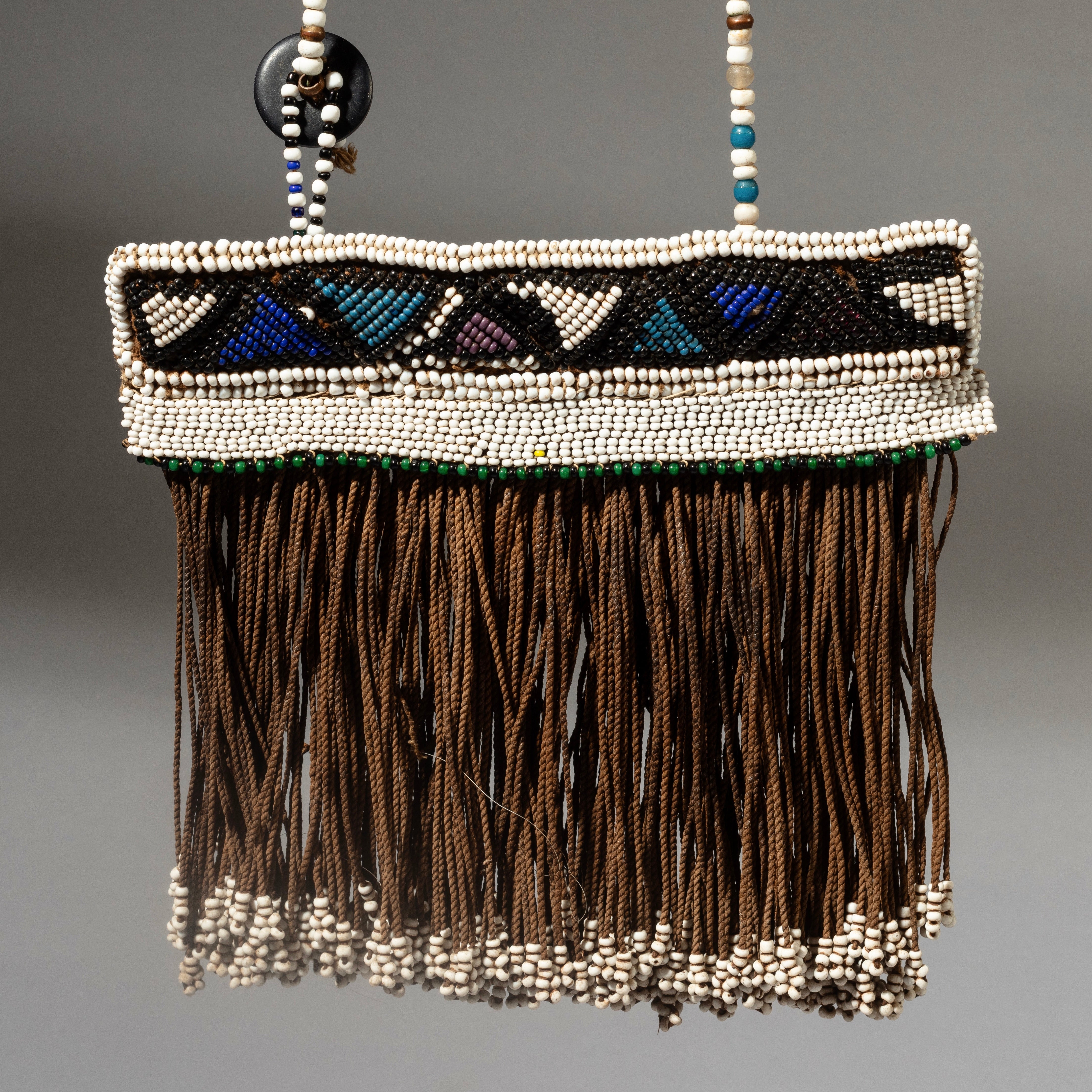 A GRAPHIC BEAD CHILDS APRON, NDEBELE TRIBE OF SOUTH AFRICA ( No 4525 )