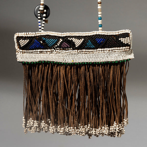 A GRAPHIC BEAD CHILDS APRON, NDEBELE TRIBE OF SOUTH AFRICA ( No 4525 )