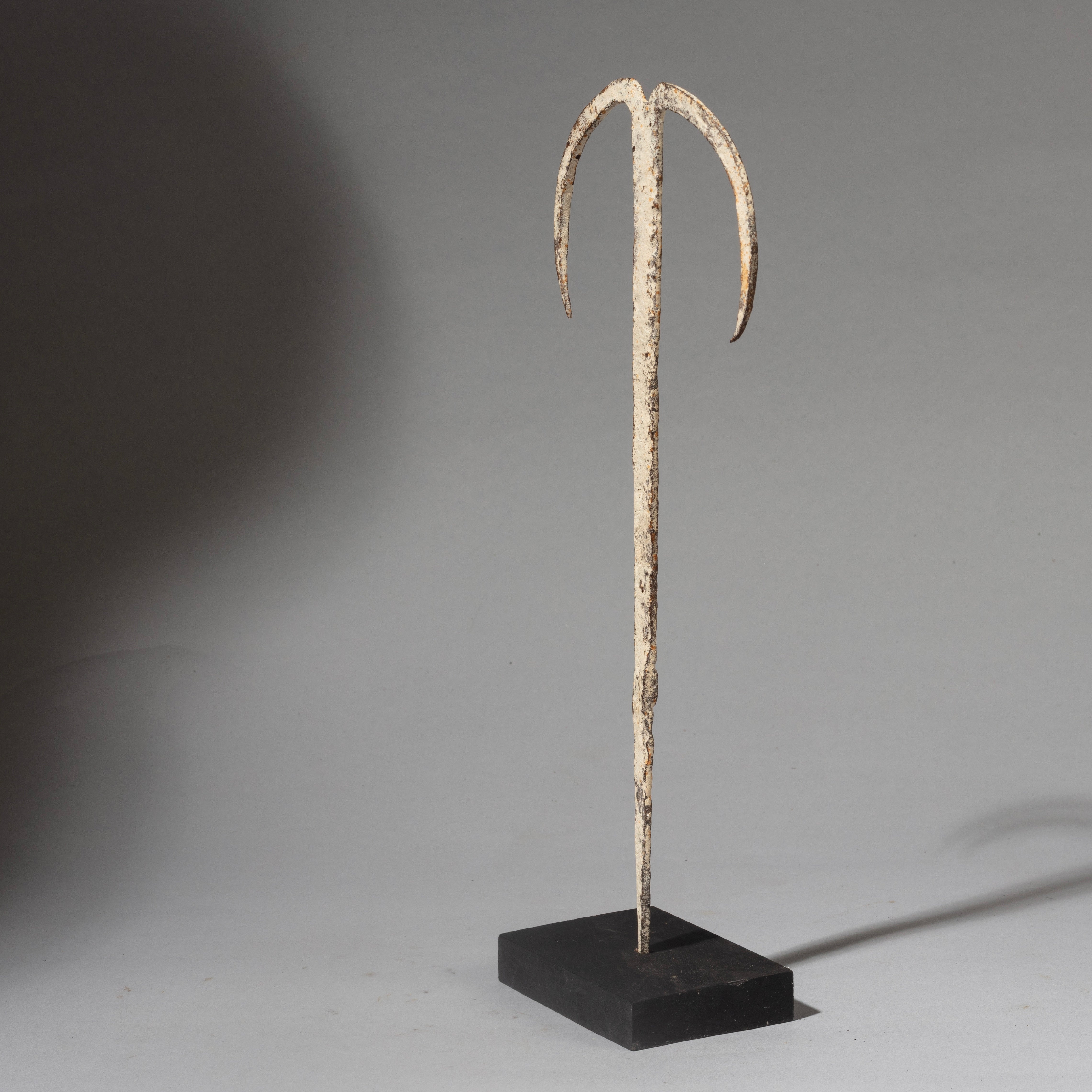 A PIGMENT ENCRUSTED IRON CRESCENT MOON FETISH FROM THE EWE TRIBE OF GHANA W.AFRICA( No 4503  )