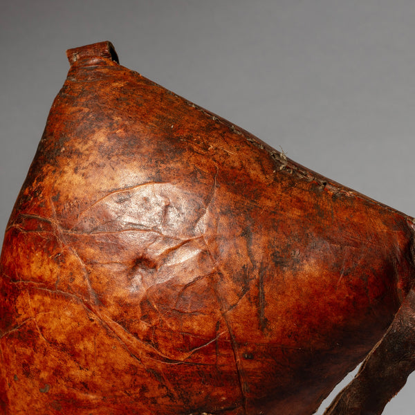A WARMLY PATINATED ETHIOPIAN LEATHER HEADREST, WELL USED, GURAGE TRIBE, E AFRICA EX UK COLLECTION ( No 4518)
