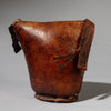 A WARMLY PATINATED ETHIOPIAN LEATHER HEADREST, WELL USED, GURAGE TRIBE, E AFRICA EX UK COLLECTION ( No 4518)