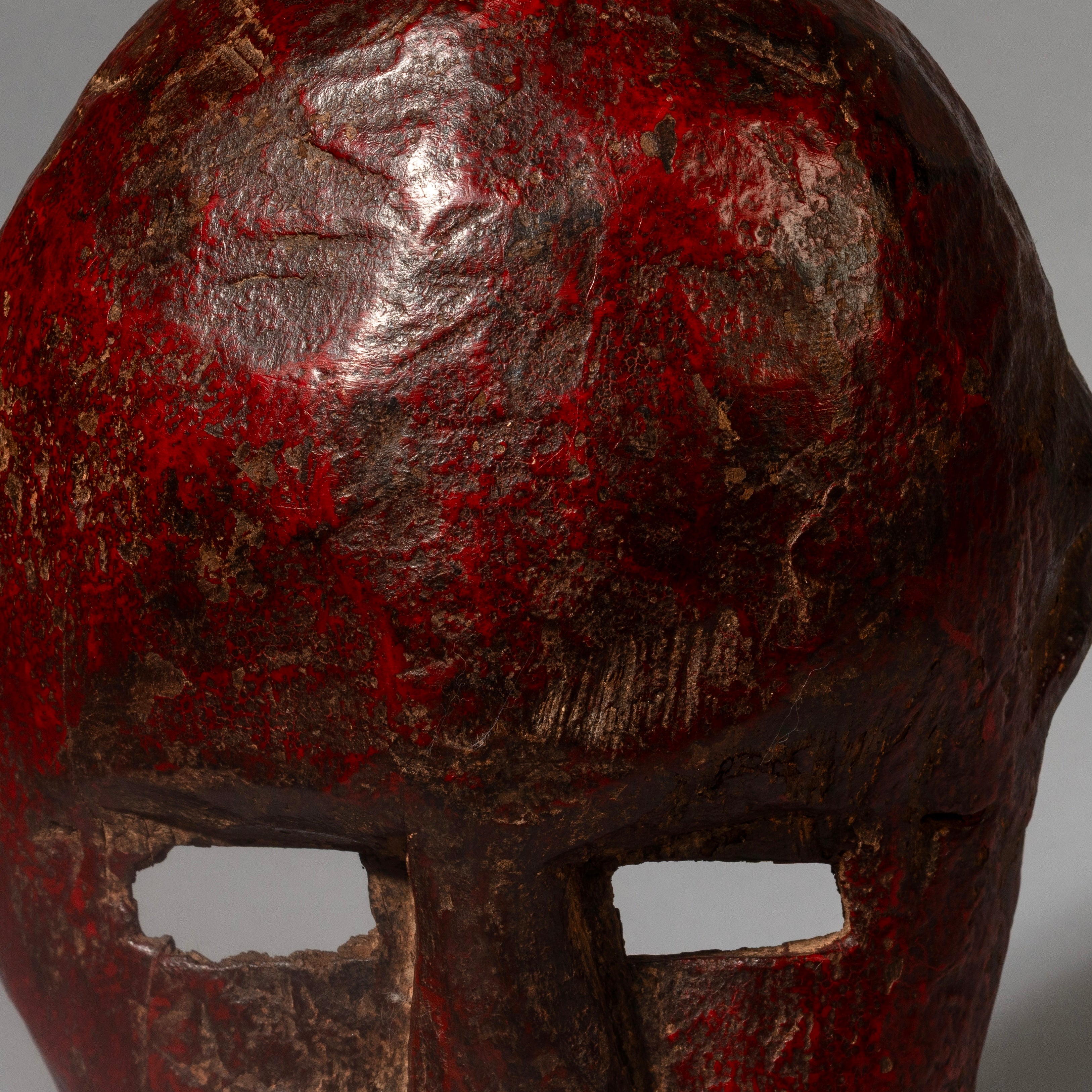 A RED SCULPTURAL MASK FROM THE SUKUMA TRIBE, TANZANIA, EAST AFRICA( No 4539 )