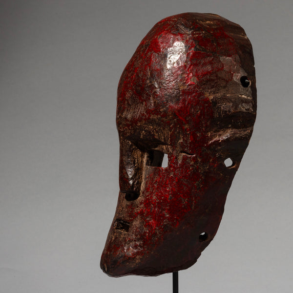 A RED SCULPTURAL MASK FROM THE SUKUMA TRIBE, TANZANIA, EAST AFRICA( No 4539 )