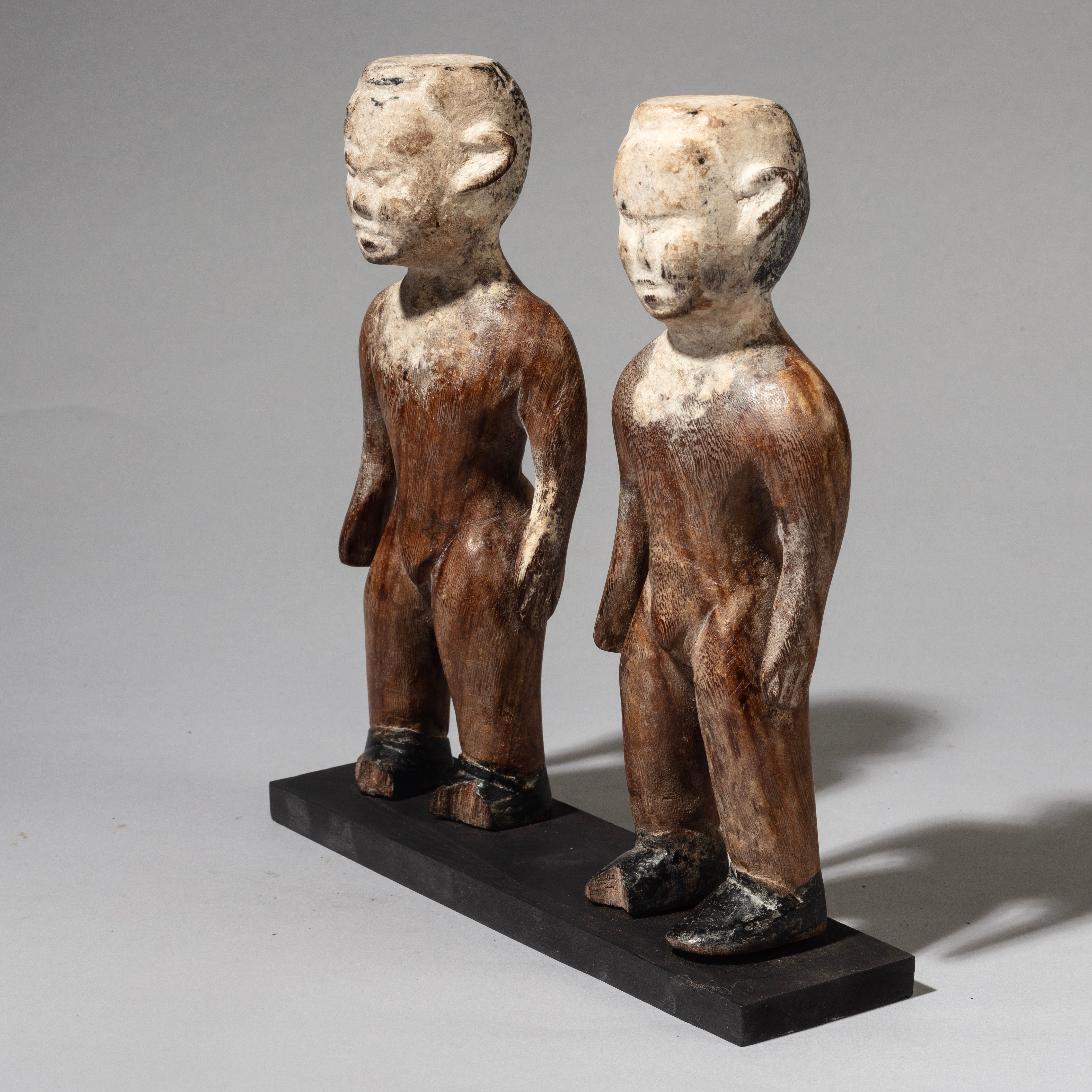 A STRIKING PAIR OF KAOLIN  FACED VENAVI DOLLS FROM EWE TRIBE GHANA WEST AFRICA( No 4515 )