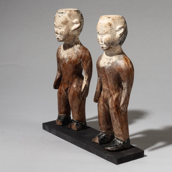 A STRIKING PAIR OF KAOLIN  FACED VENAVI DOLLS FROM EWE TRIBE GHANA WEST AFRICA( No 4515 )
