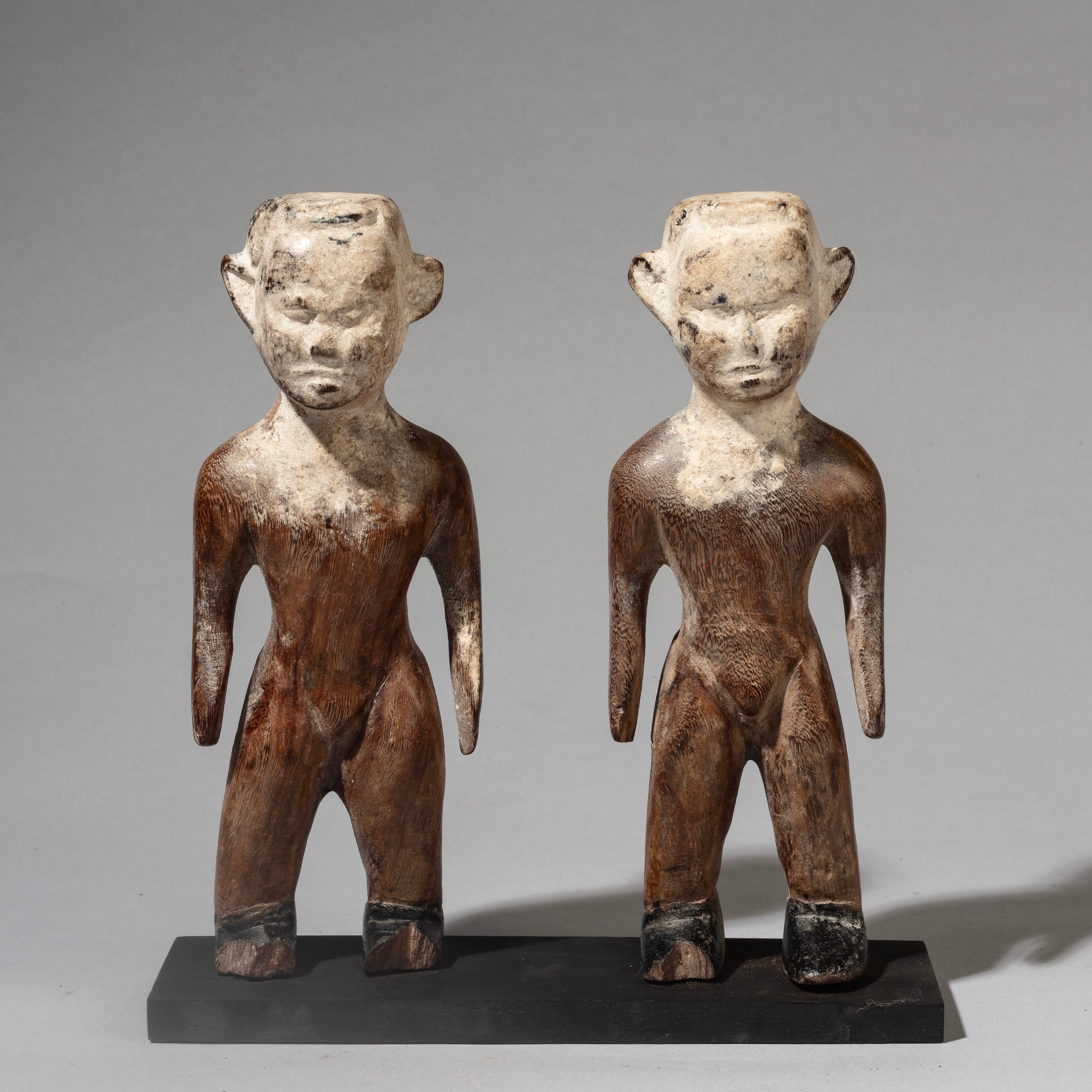 A STRIKING PAIR OF KAOLIN  FACED VENAVI DOLLS FROM EWE TRIBE GHANA WEST AFRICA( No 4515 )