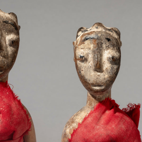 A RED FABRIC WRAPPED PAIR OF VENAVI DOLLS FROM EWE TRIBE GHANA WEST AFRICA ( No 4516 )