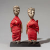 A RED FABRIC WRAPPED PAIR OF VENAVI DOLLS FROM EWE TRIBE GHANA WEST AFRICA ( No 4516 )