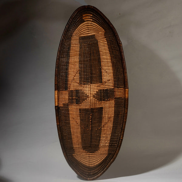 A STUNNING NATURAL FIBRE SHIELD FROM THE NGOMBE TRIBE OF THE CONGO, EX UK COLLECTION  [ No 4544 )