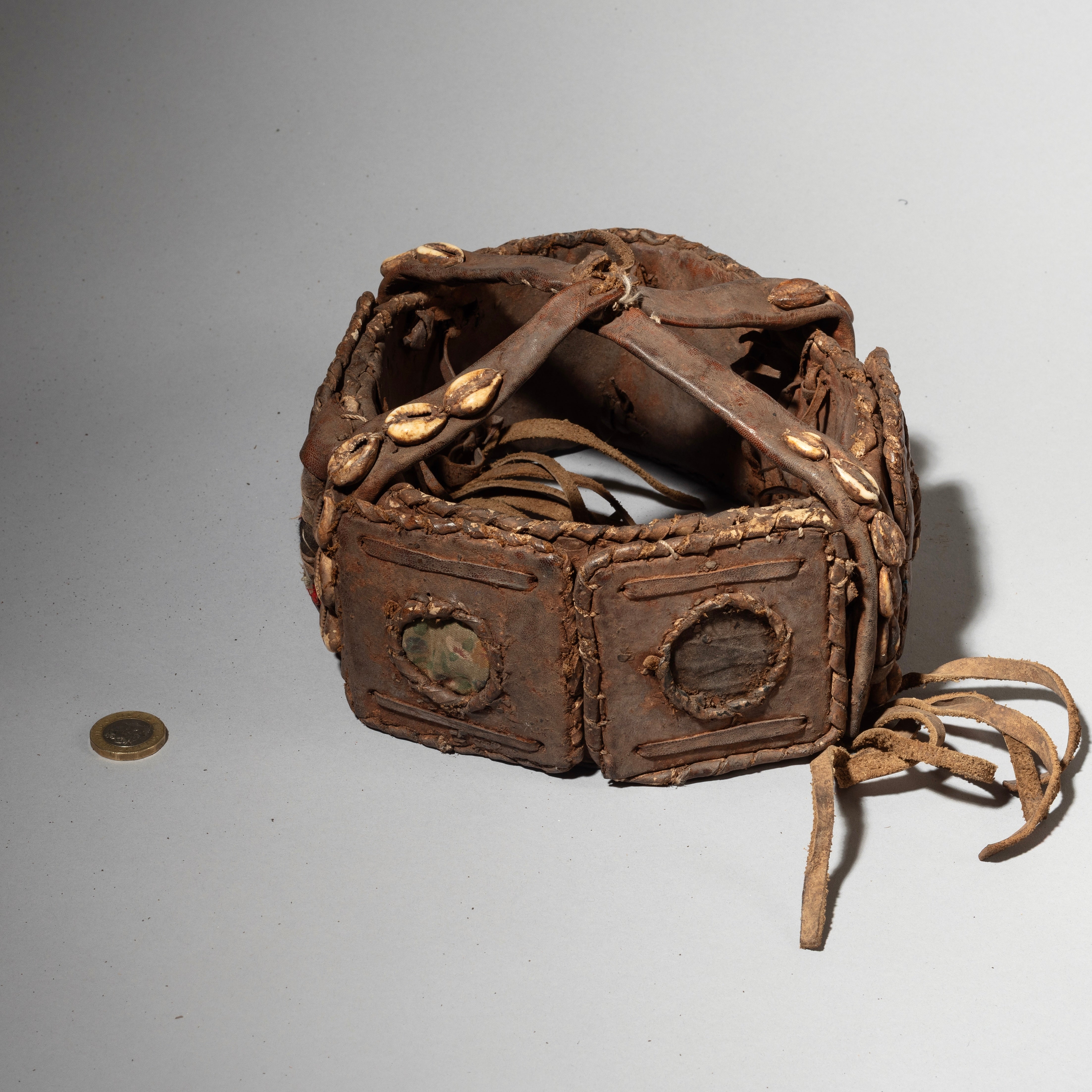 AN ENCRUSTED HAT FETISH FROM THE EWE TRIBE OF GHANA W.AFRICA( No 4377 )