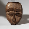 A PRECISE PASSPORT MASK WITH REMNANTS OF PIGMENT , LEGA TRIBE CONGO ( No 4598)