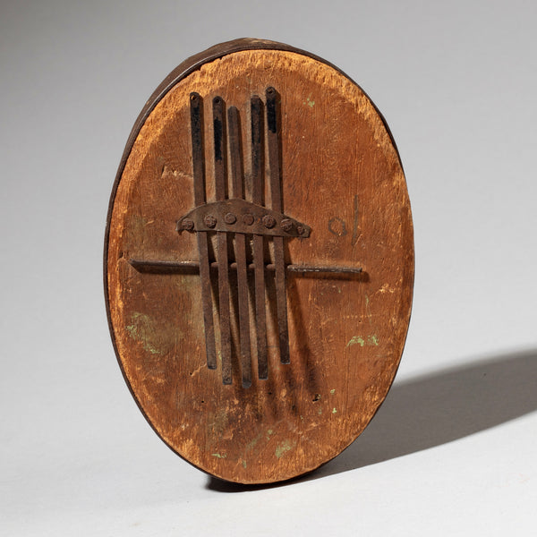 A VINTAGE  THUMB PIANO MADE FROM AN OLD  TIN FROM CONGO , EX Uk COLL ( No 4620 )