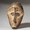 A POWERFUL WHITE PIGMENT MASK LEGA TRIBE, CONGO ( No 4599)