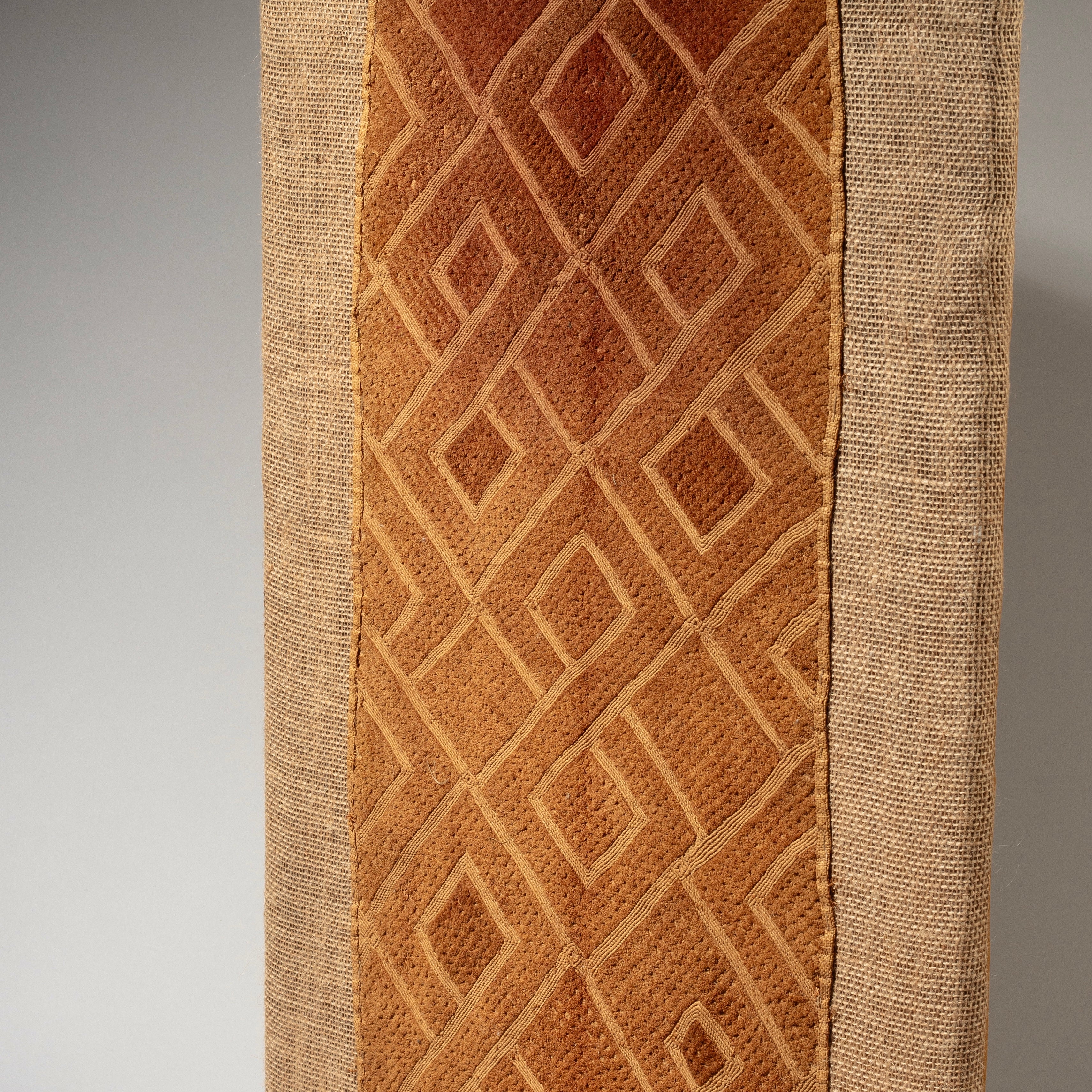 A MOUNTED RAFFIA SHOOWA PANEL FROM THE KUBA PEOPLE OF CONGO ( No 4616 )