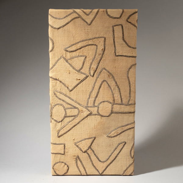 A LIGHT BEIGE PRECISELY APPLIQUÉD MOUNTED OLD RAFFIA SKIRT FROM THE KUBA PEOPLE OF CONGO ( No 4618 )