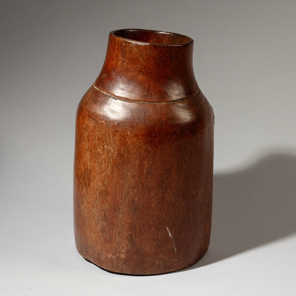 A LARGE  CHUNKY HONEY POT WITH METAL INDIGENOUS REPAIRS FROM THE TUTSI TRIBE OF RWANDA ( No 4608 )