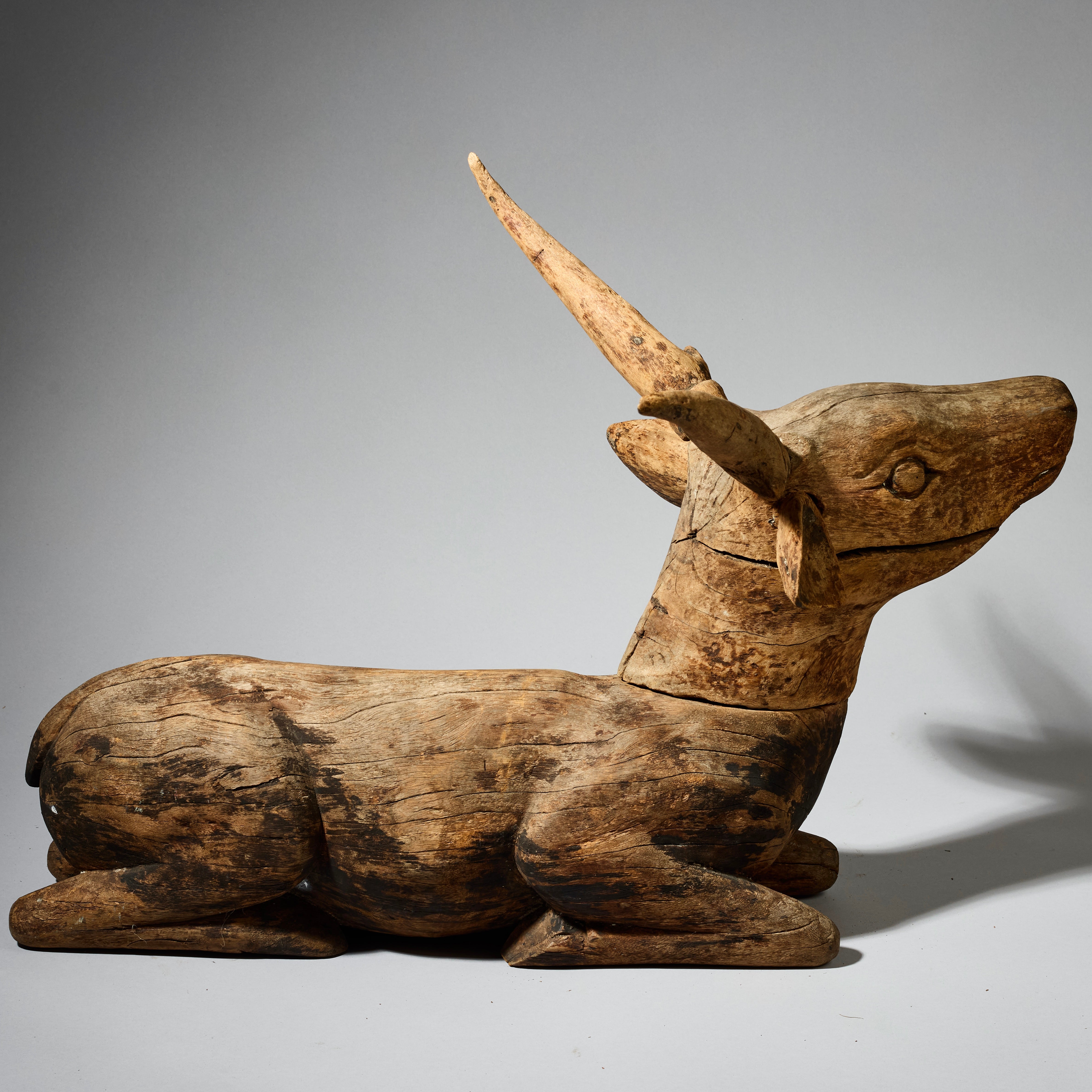 A LARGE WEATHERED DEER SCULPTURE FROM INDONESIA ( No 4681 )
