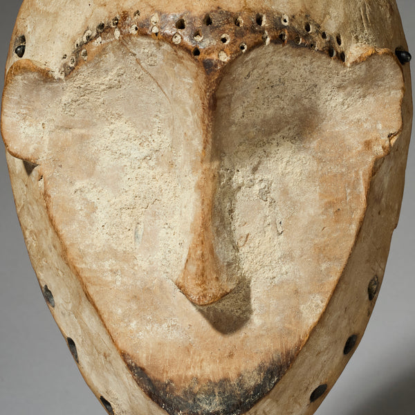 A HARMONIOUS MASK FROM LEGA TRIBE, CONGO ( No 4720 )