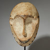 A HARMONIOUS MASK FROM LEGA TRIBE, CONGO ( No 4720 )