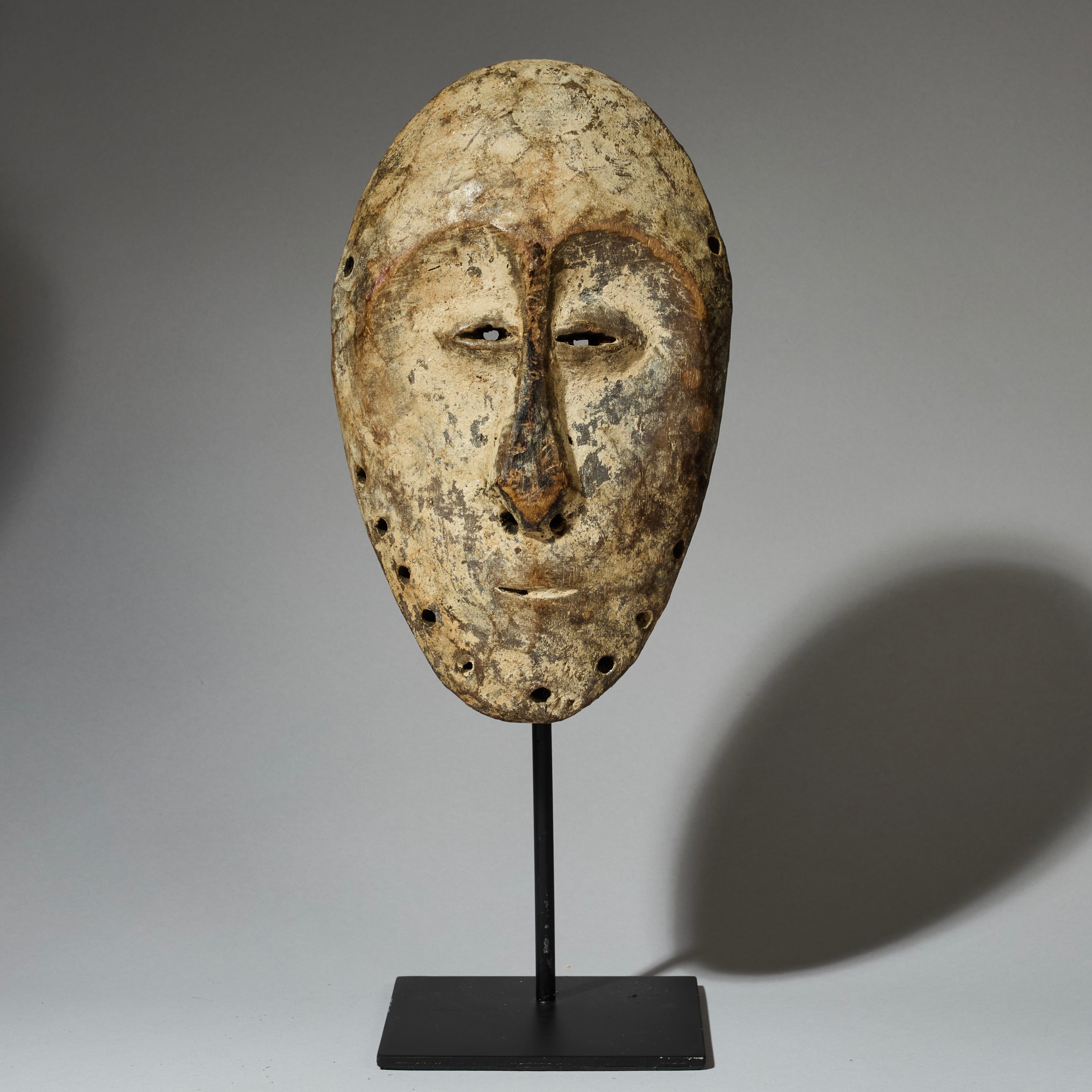 A NICELY PATINATED LEGA TRIBE MASK FROM CONGO [ No 4689 )