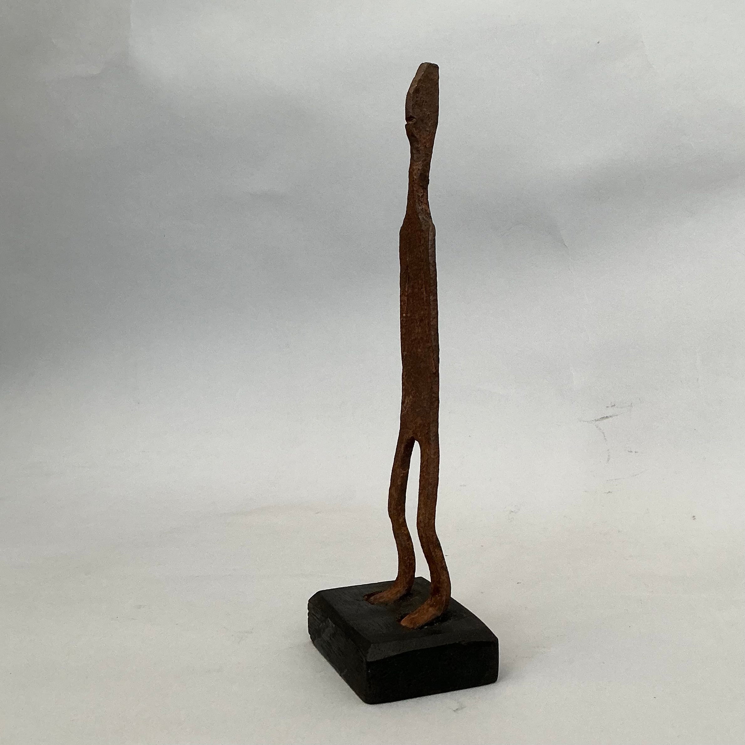 A ELEGANT IRON FIGURE , FROM LOBI TRIBE BURKINA FASO ( No 4715 )
