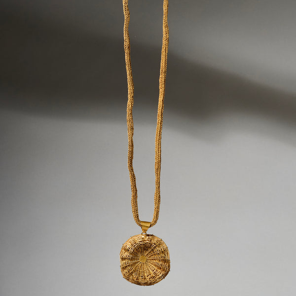 AN INTRICATELY WOVEN BRASS NECKLACE WITH DISC PENDANT, IVORY COAST (  No 4770